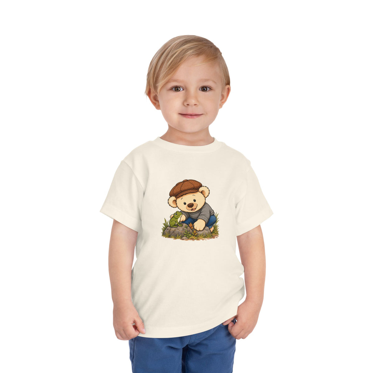 Frog Pickles toddler tee in Natural, worn by a toddler