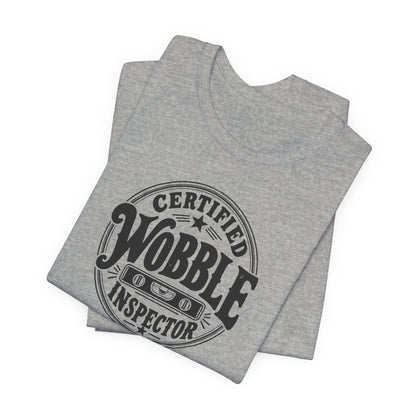 Certified Wobble Inspector tee, Athletic Heather grey, folded