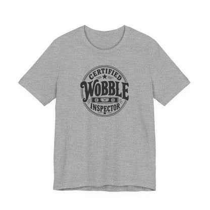 Certified Wobble Inspector funny workshop tee in Athletic Heather grey, front
