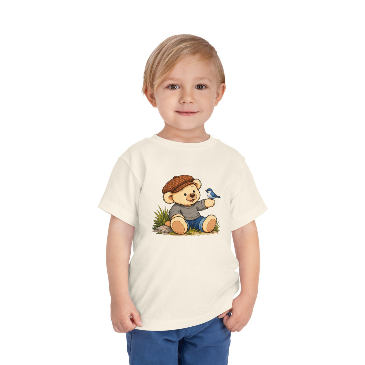 Blue Bird Pickles toddler tee in Natural, worn by a toddler