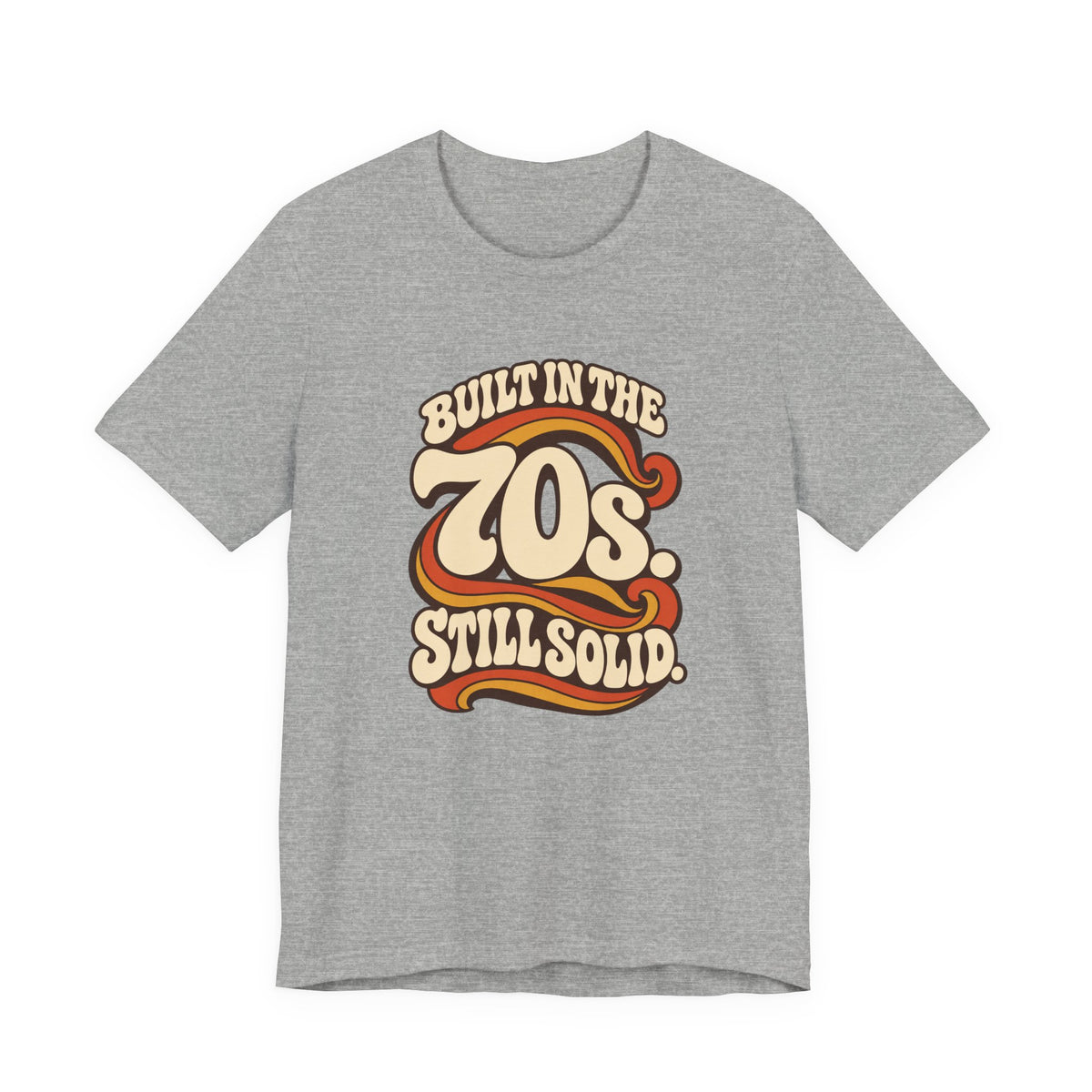 Built in the 70s. Still Solid Tee in Athletic Heather, front view with retro 70s lettering