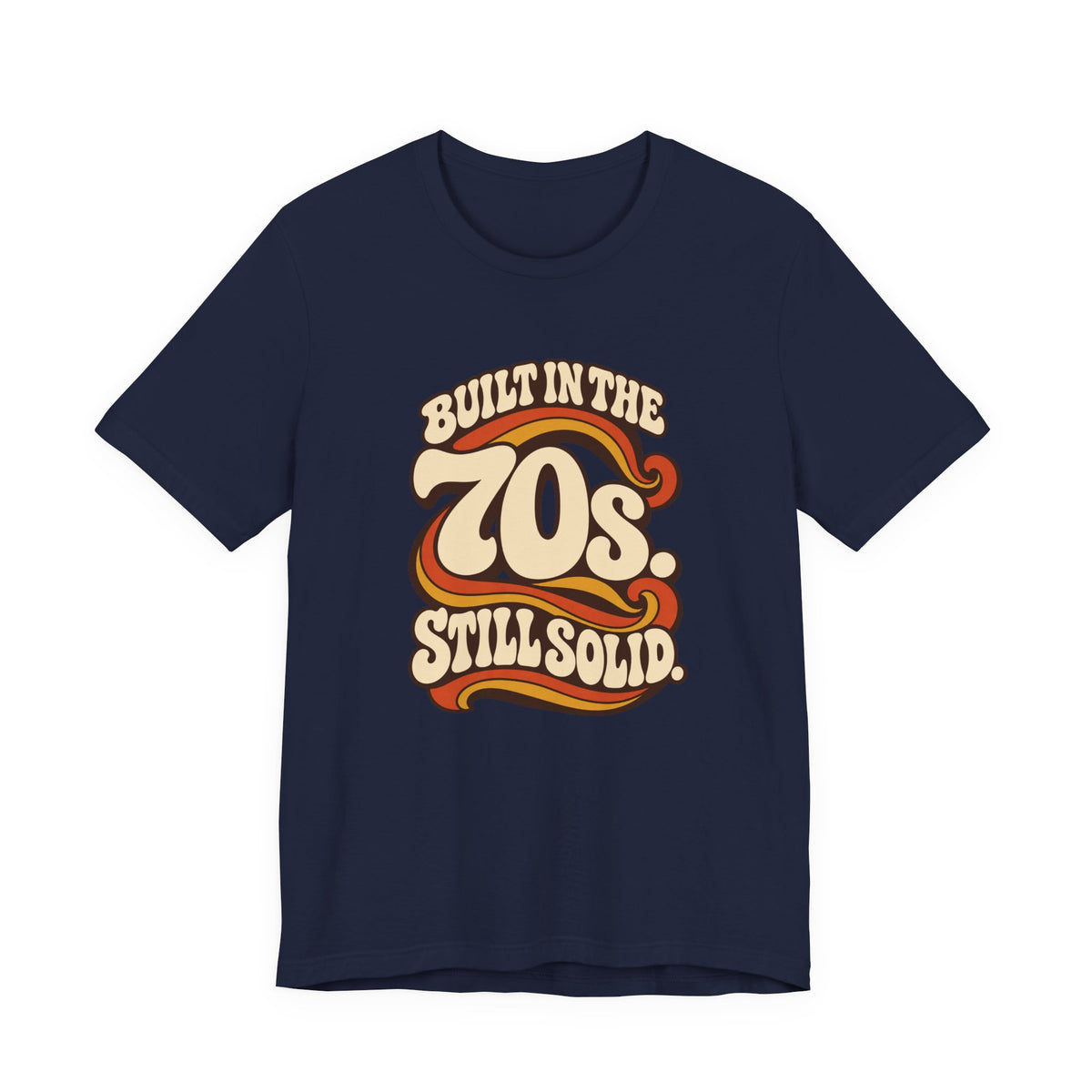 Built in the 70s. Still Solid Tee in Navy, front view with retro 70s lettering
