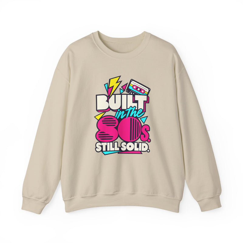 Built in the 80s. Still Solid Crewneck Sweatshirt in Sand, front view with neon cassette design