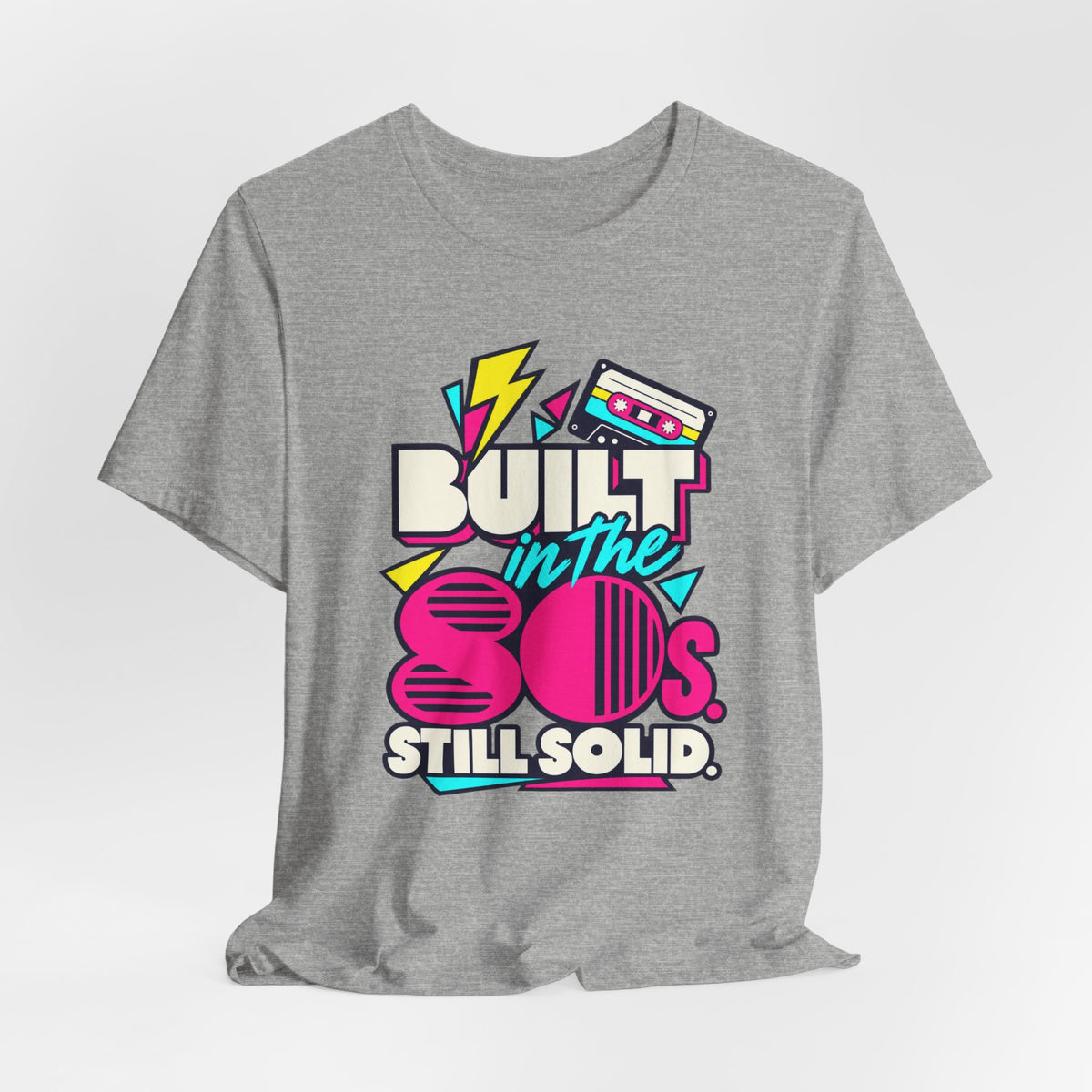Built in the 80s. Still Solid Tee in Athletic Heather, styled photo