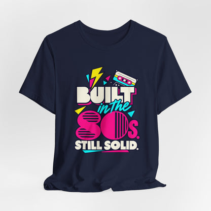 Built in the 80s. Still Solid Tee in Navy, styled photo