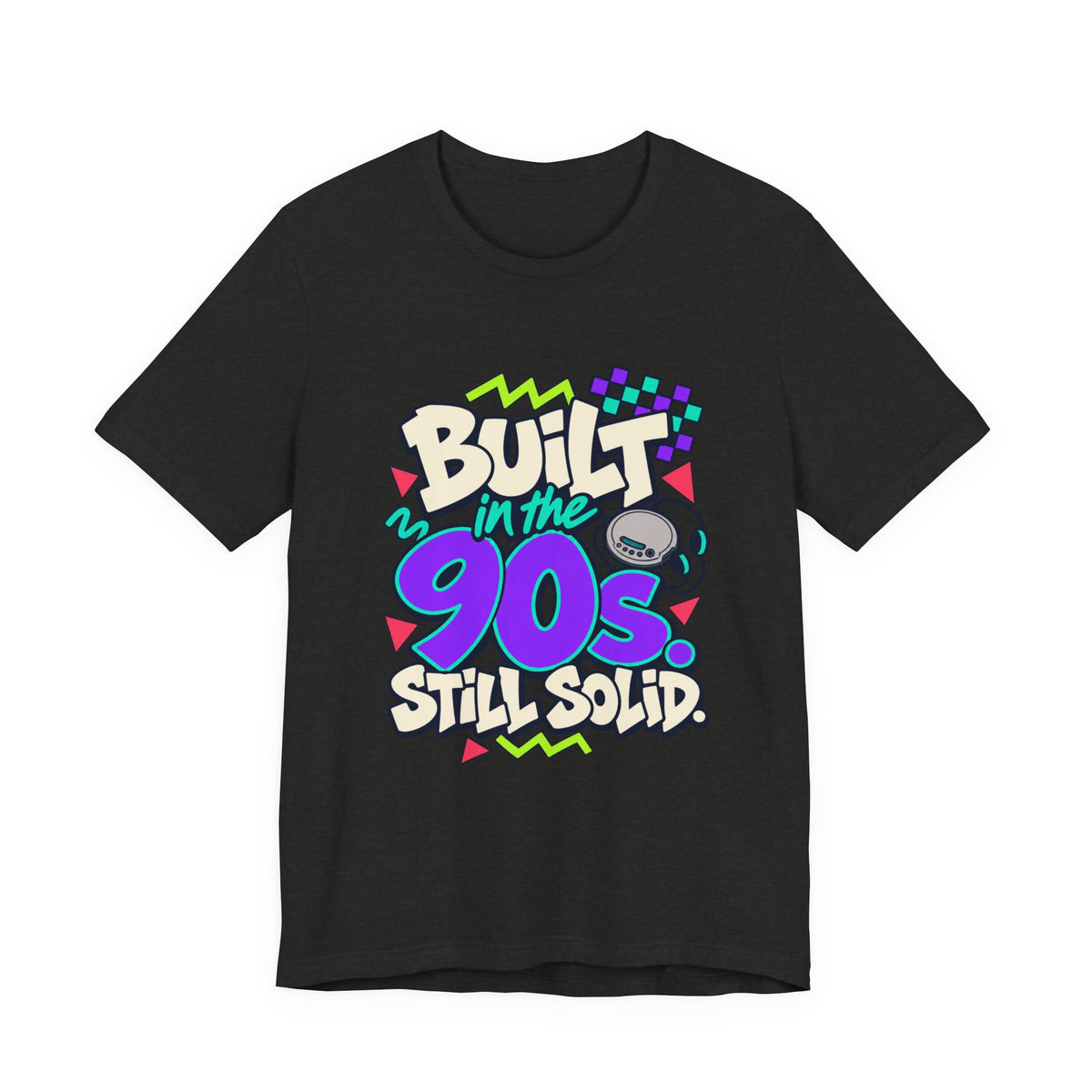 Built in the 90s. Still Solid Tee in Black Heather, front view with graffiti-style lettering