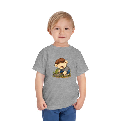 Frog Pickles toddler tee in Athletic Heather, worn by a toddler