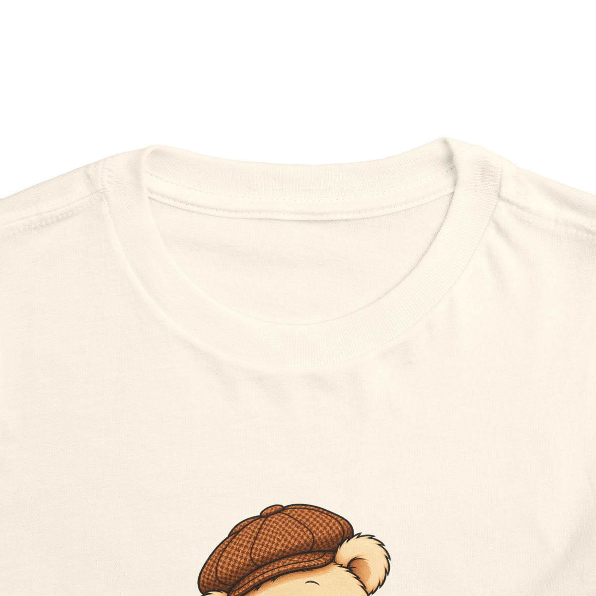 Frog Pickles toddler tee in Natural, close-up of neckline and print
