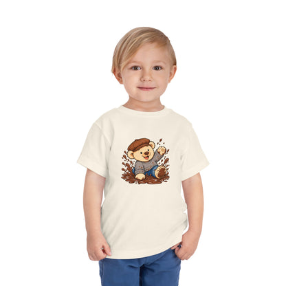 Mucky Pickles toddler tee in Natural, worn by a toddler