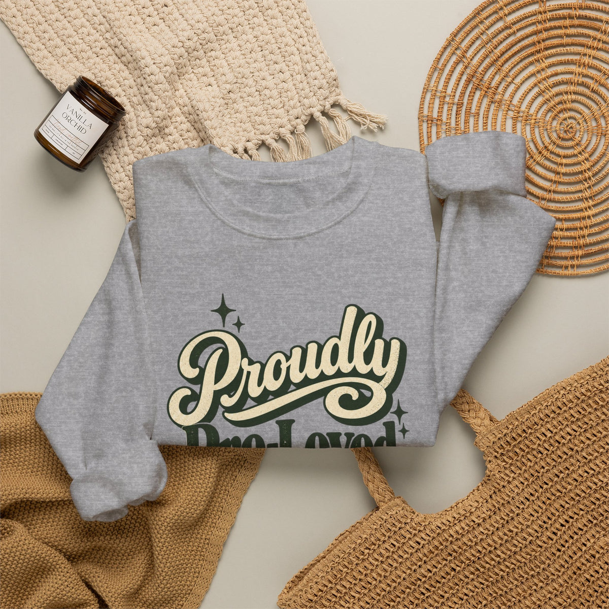 Proudly Pre-Loved Crewneck Sweatshirt in Sport Grey, styled flat lay