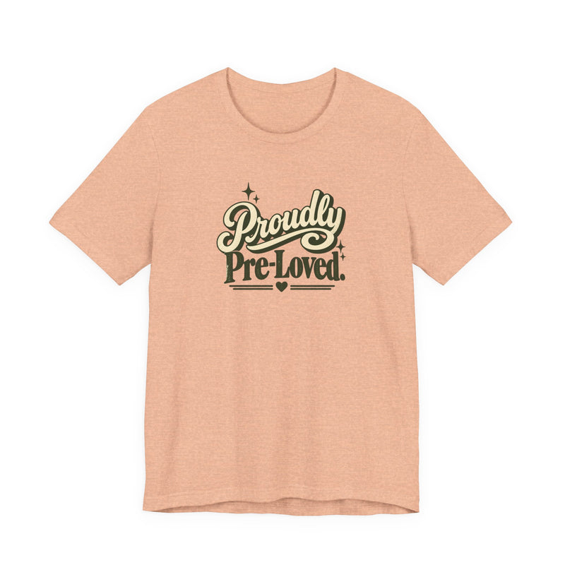 Proudly Pre-Loved funny tee in Heather Peach, front view
