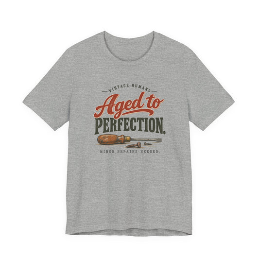 Vintage Humans Aged To Perfection funny tee in Athletic Heather, front view