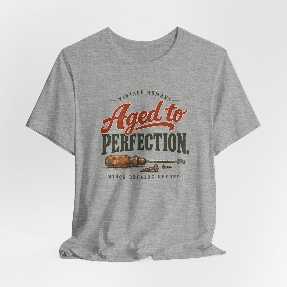 Vintage Humans Aged To Perfection funny tee in Athletic Heather, lifestyle shot